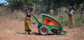 A female farmer using Aftrak machinery in Africa