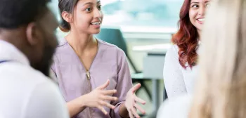 Psychology students chat in a group